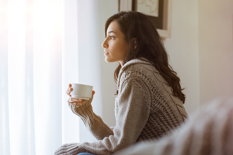 woman-thinking-drinking-coffee