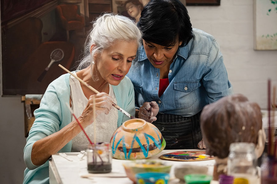 Elderly-woman-taking-pottery-class