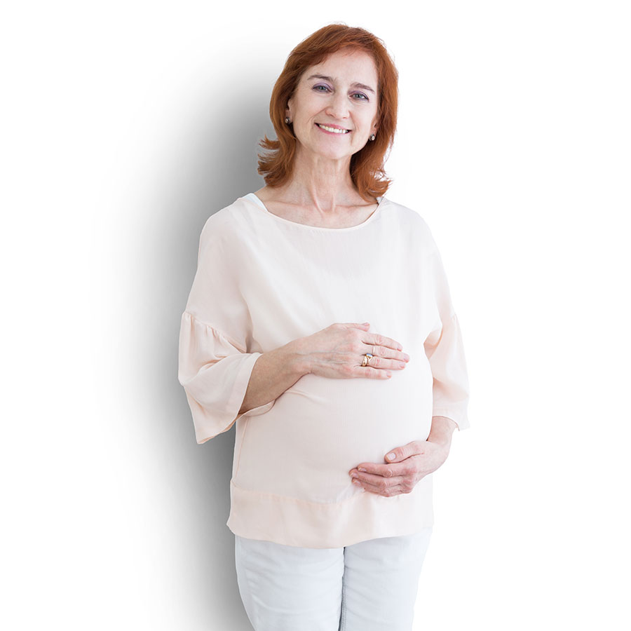 happy-middleage-pregnant-woman-holding-her-stomach