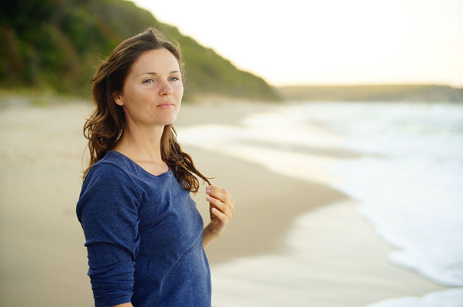 woman-standing-by-the-water