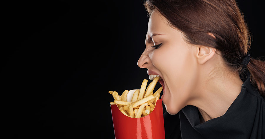 woman-eating-fries