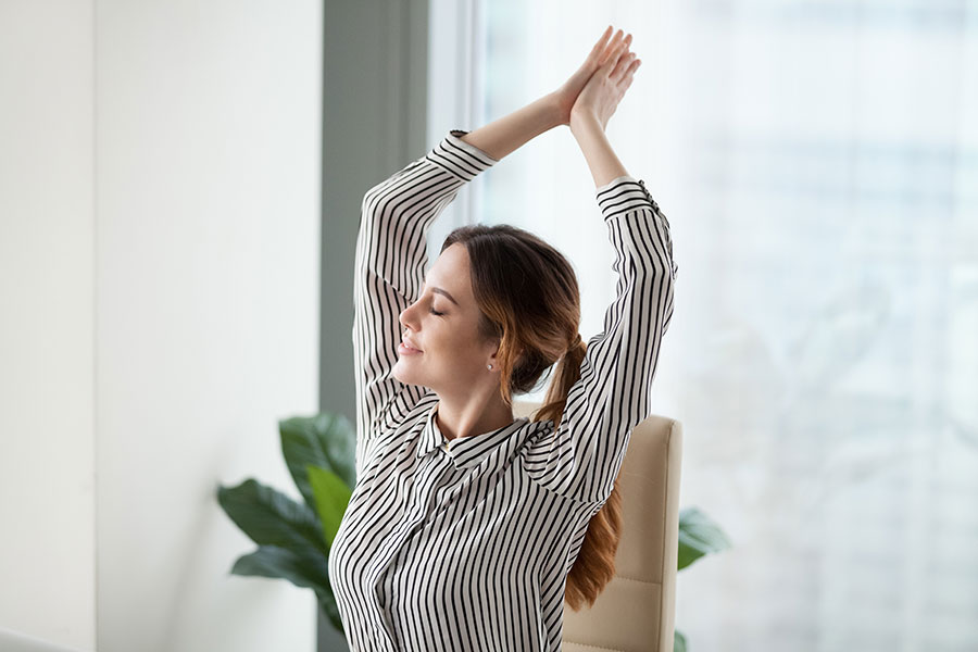 woman-stretching-at-work