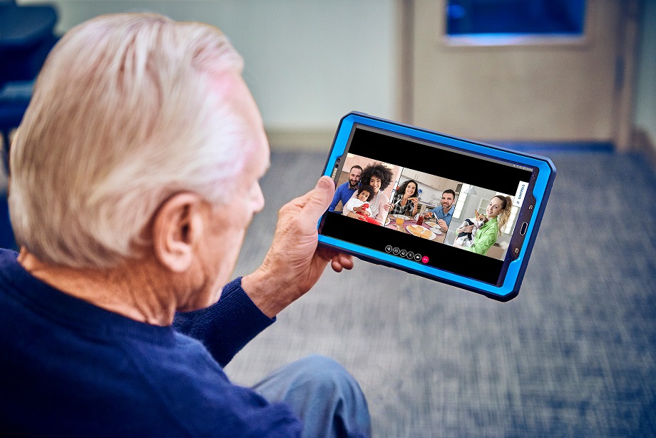 senior-man-holding-tablet